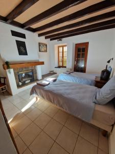 Postel nebo postele na pokoji v ubytování Grande Maison à la Campagne