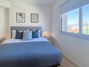 Ένα ή περισσότερα κρεβάτια σε δωμάτιο στο Plateia suite Grigio