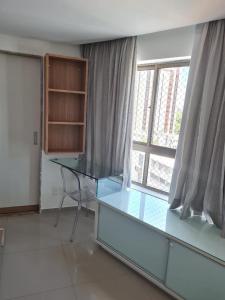 Ένα ή περισσότερα κρεβάτια σε δωμάτιο στο Flat mobiliado e bem localizado