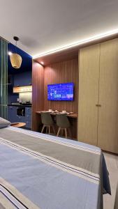 Μια τηλεόραση ή/και κέντρο ψυχαγωγίας στο Flat De Maré - Orla de Salvador +12 φωτογραφίες