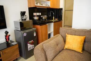 Kuchyň nebo kuchyňský kout v ubytování Savannah Residence by Royal Surburbs