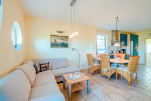 Posezení v ubytování Fewo LampRieger Maisonette rechts