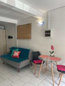 Posezení v ubytování Location studio sur les hauteurs du Marin