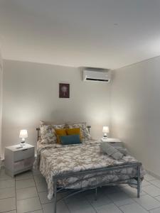 Postel nebo postele na pokoji v ubytování Location studio sur les hauteurs du Marin