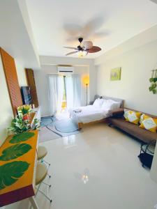 a living room with a bed and a ceiling at Angsana Breeze-Alpine Crosswinds Tagaytay in Ulot +103 photos