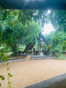 a park with a playground with a slide at Hotel Hanguk Villa in Dambulla +88 photos