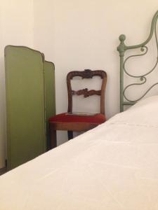 Postel nebo postele na pokoji v ubytování Residenza La Corte Assisi