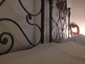 Postel nebo postele na pokoji v ubytování Residenza La Corte Assisi