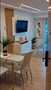 Et tv og/eller underholdning på Vista y confort - Cerca de todo