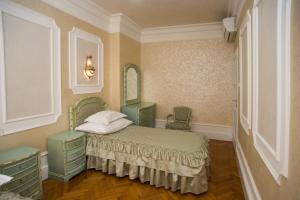 Posteľ alebo postele v izbe v ubytovaní Art Apartments Celakovskeho Sady