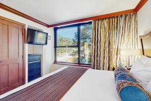 Postel nebo postele na pokoji v ubytování Resort at Everline Resort & Spa #560 + 12 fotografií