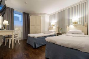 Postel nebo postele na pokoji v ubytování Best Western Hotel Bentleys