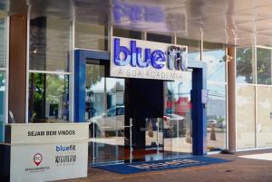 a store front with a sign for a car dealership at Apartamento com aconchego e modernidade in Ribeirão Preto +45 photos