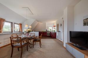 Телевизор и/или развлекательный центр в Haus Wattblick OG