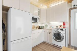 Kuchyň nebo kuchyňský kout v ubytování Twin Palms Resort