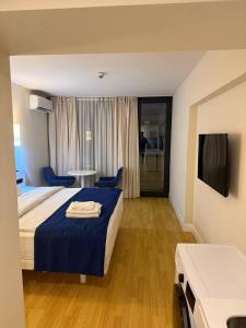 Μια τηλεόραση ή/και κέντρο ψυχαγωγίας στο Orbi City rooms