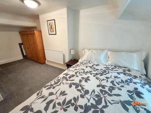 Postel nebo postele na pokoji v ubytování Hundy Cottage + 5 fotografií