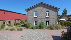 フェーマルンにある"Bauernhof-Claussen", Haus Welleの赤納屋付大レンガ造り