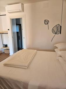 Postel nebo postele na pokoji v ubytování Dolcevita guest house