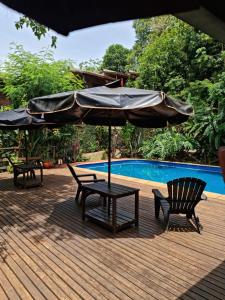 Πισίνα στο ή κοντά στο Los Troncos Jasy