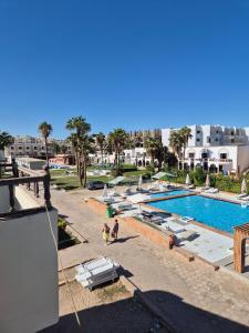 a view of a swimming pool at a resort at Elixir Hotel Hurghada 2 in Hurghada