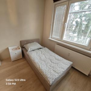 Postel nebo postele na pokoji v ubytování Apartmán Nela + 1 fotografie