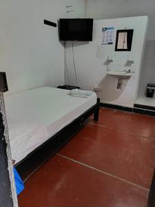 TV a/nebo společenská místnost v ubytování Hotel Efata + 43 fotografií
