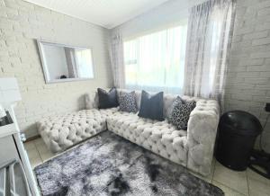 Posezení v ubytování Zhantique Guest House 2- Unit 12