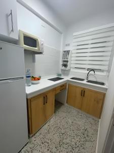 Kuchyň nebo kuchyňský kout v ubytování Puerto Centro House Studio