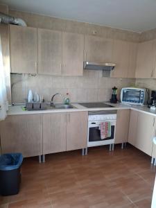 Kuchyň nebo kuchyňský kout v ubytování Chalet en Chiclana