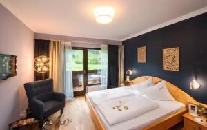 Postel nebo postele na pokoji v ubytování Hotel LÄRCHENHOF