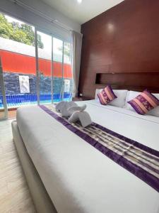 Postel nebo postele na pokoji v ubytování 2 private pool villa 4 bed 6 bath book now