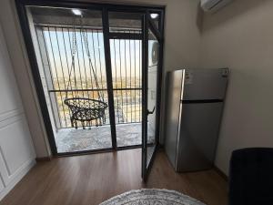 Η κουζίνα ή μικρή κουζίνα στο Квартира студио