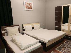 Postel nebo postele na pokoji v ubytování Park Orman