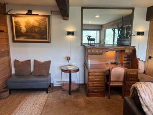 a bedroom with a desk and a chair and a desk at Aspen Chalet 976 in Aspen +34 photos