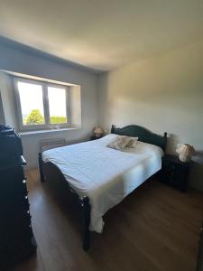 Postel nebo postele na pokoji v ubytování Garden and spectacular views + 10 fotografií