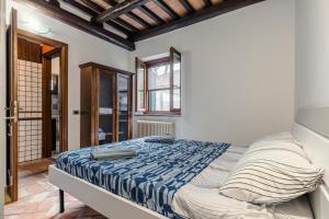 Postel nebo postele na pokoji v ubytování Queen Home