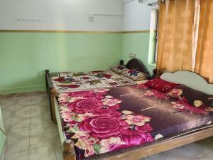 Postel nebo postele na pokoji v ubytování FullMoon Guesthouse