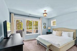 Ένα ή περισσότερα κρεβάτια σε δωμάτιο στο wave watchers