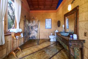 a bathroom with a shower and a toilet at Hotel Casa San Pancho in San Francisco +39 photos