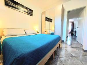 Ένα ή περισσότερα κρεβάτια σε δωμάτιο στο Novara Cozy-Suite