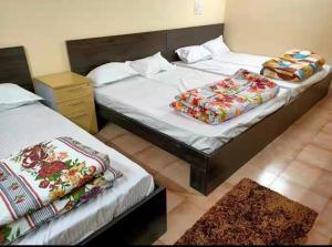 Postel nebo postele na pokoji v ubytování Malnad home stay