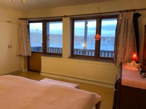 Ένα ή περισσότερα κρεβάτια σε δωμάτιο στο Lakeview Villa