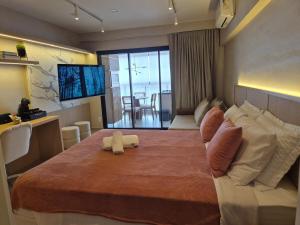 Postel nebo postele na pokoji v ubytování Studio 706 Esmeralda