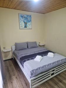 Ένα ή περισσότερα κρεβάτια σε δωμάτιο στο FreshAir Boutique