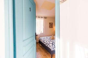 Postel nebo postele na pokoji v ubytování Le Lumineux 3 chambres-Parking-Centre + 18 fotografií