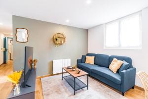 Posezení v ubytování Le Lumineux 3 chambres-Parking-Centre