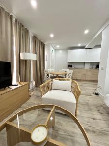 TV a/nebo společenská místnost v ubytování Camarena Suites + 5 fotografií