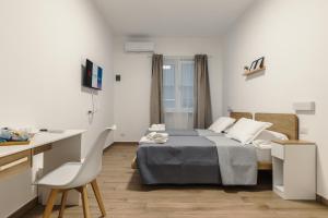 Postel nebo postele na pokoji v ubytování Tury's House