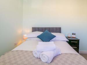 En eller flere senge i et værelse på Swallows Nest